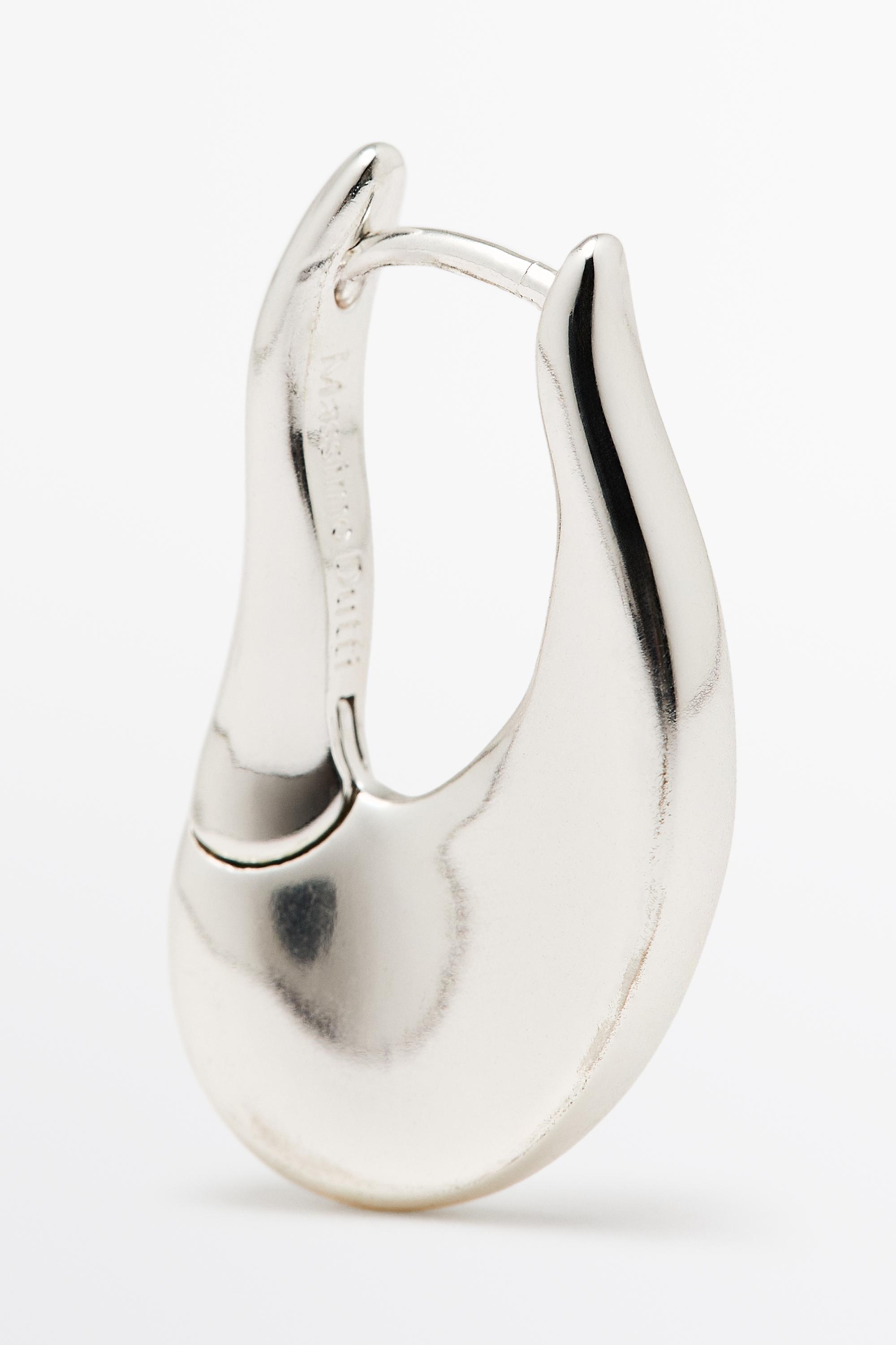 Boucles d’oreilles créoles lignes fluides